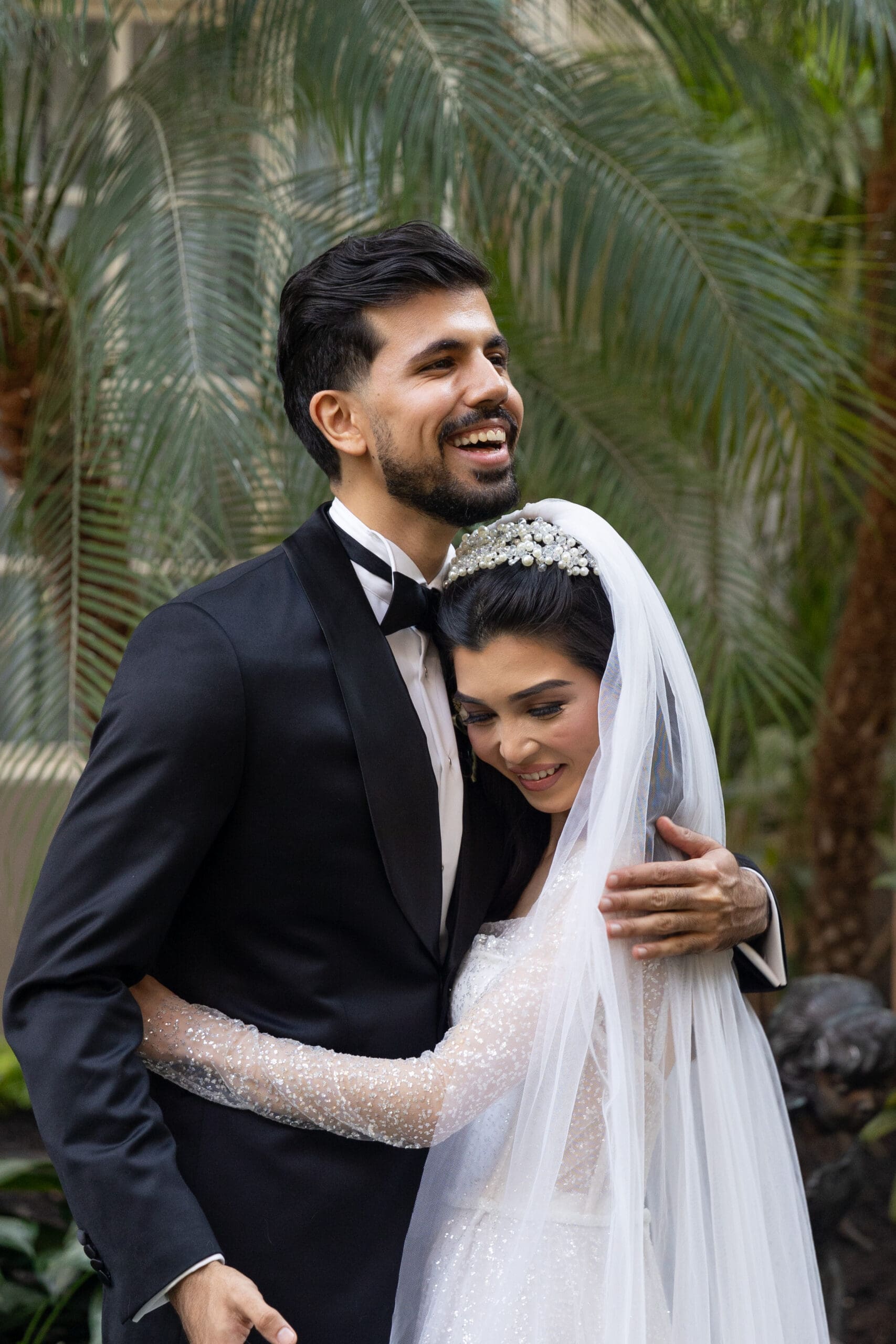 bride and groom hugging during wedding ceremony